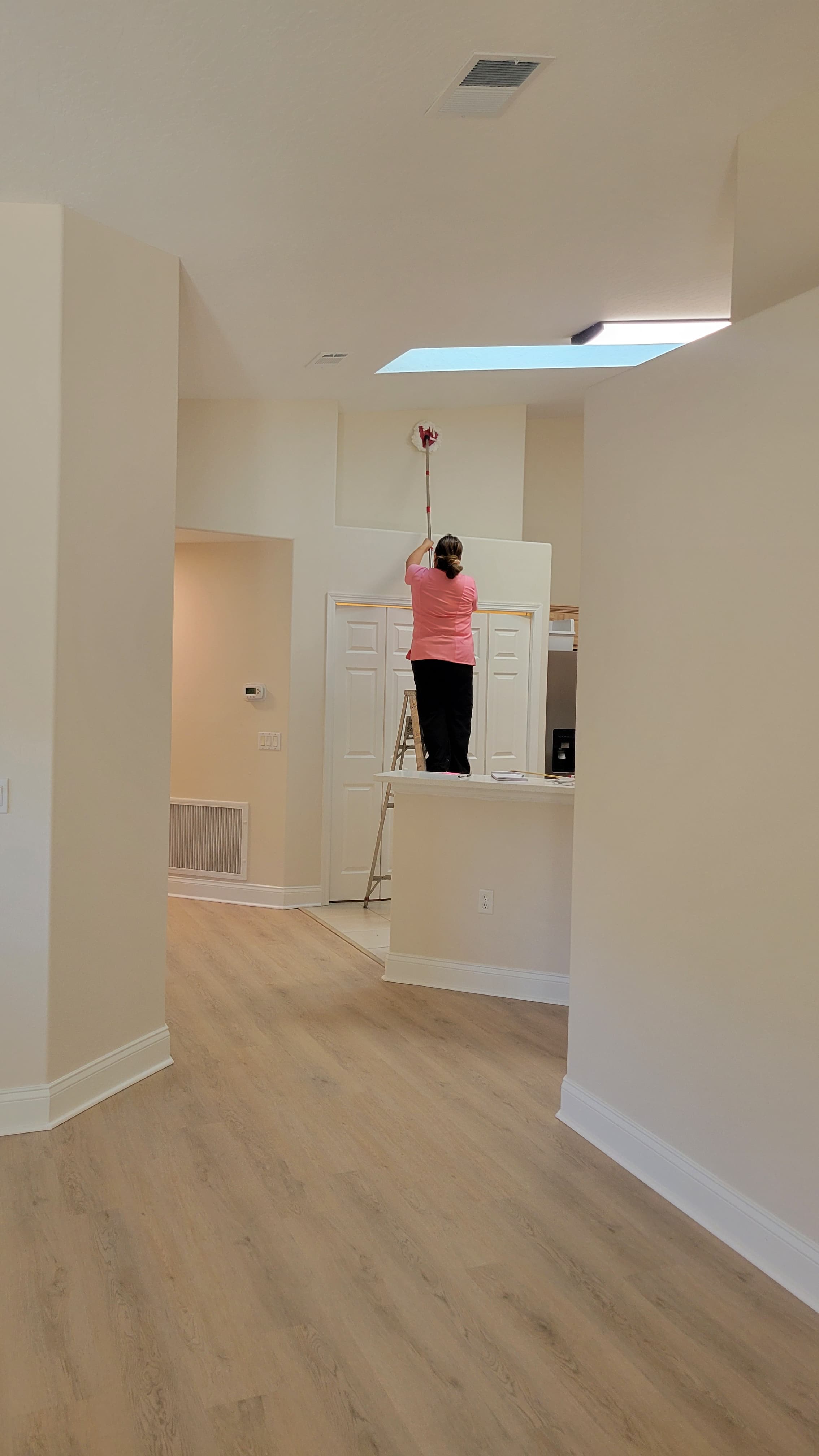 Detailed kitchen and living area cleaning by HOUSEKEEPING, LLC
